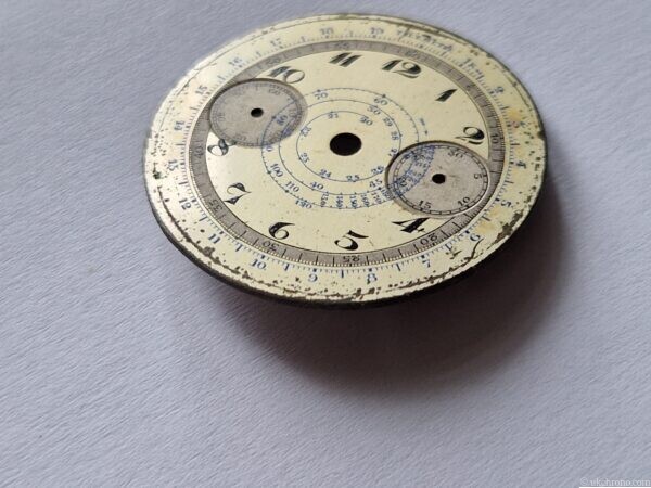Vintage Valjoux 22 chronograph dial, approximately 33.1 mm diameter. Pre-owned condition with age-related wear, ageing and marks. Sold as pictured.
