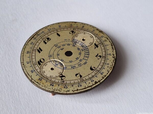 Vintage Valjoux 22 chronograph dial, approximately 33.1 mm diameter. Pre-owned condition with age-related wear, ageing and marks. Sold as pictured.