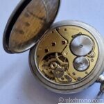 vintage Zenith open face pocket watch fitted with the hand-wound Zenith Calibre 18-28-31 movement.