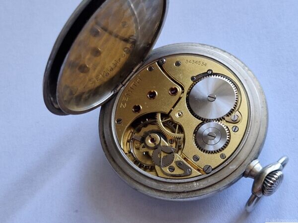 vintage Zenith open face pocket watch fitted with the hand-wound Zenith Calibre 18-28-31 movement.