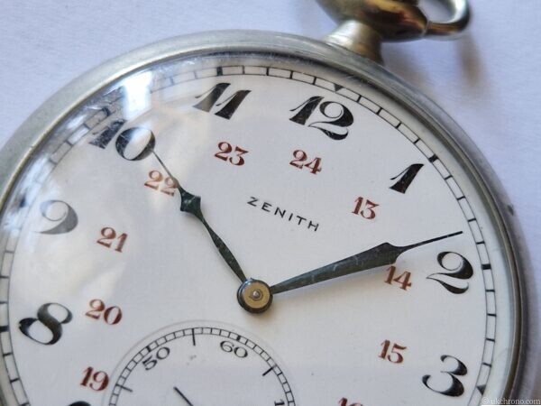 vintage Zenith open face pocket watch fitted with the hand-wound Zenith Calibre 18-28-31 movement.