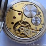 vintage Zenith open face pocket watch fitted with the hand-wound Zenith Calibre 18-28-31 movement.