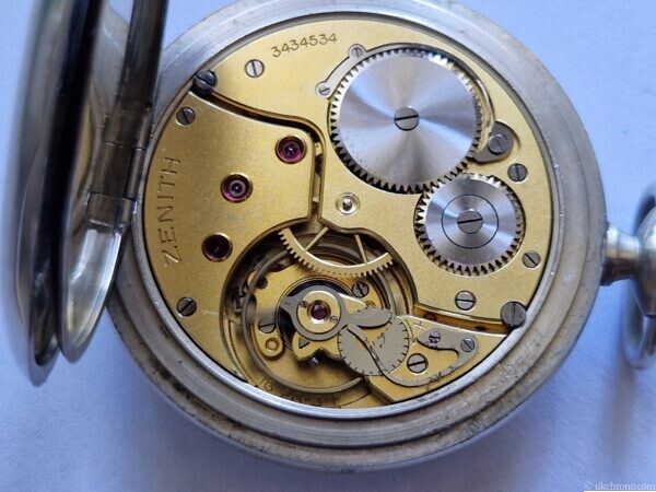 vintage Zenith open face pocket watch fitted with the hand-wound Zenith Calibre 18-28-31 movement.