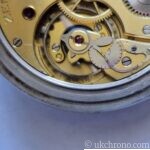 vintage Zenith open face pocket watch fitted with the hand-wound Zenith Calibre 18-28-31 movement.