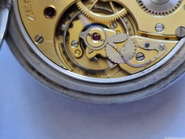 vintage Zenith open face pocket watch fitted with the hand-wound Zenith Calibre 18-28-31 movement.